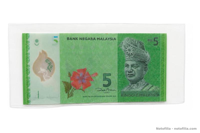 Anverso del 5 ringgit de polímero, serie AA 1955984: Tuanku Abdul Rahman, hibisco, ventana del cálao y firma de Zeti Akhtar Aziz.