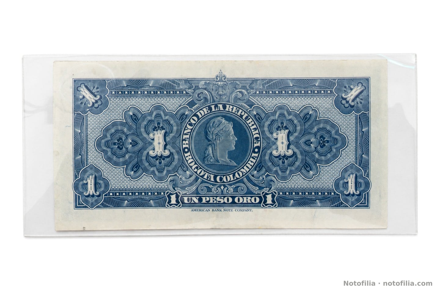 Back of the 1 peso oro, Pick 380g: Liberty in a blue medallion, the figures 1, and the American Bank Note Company imprint.