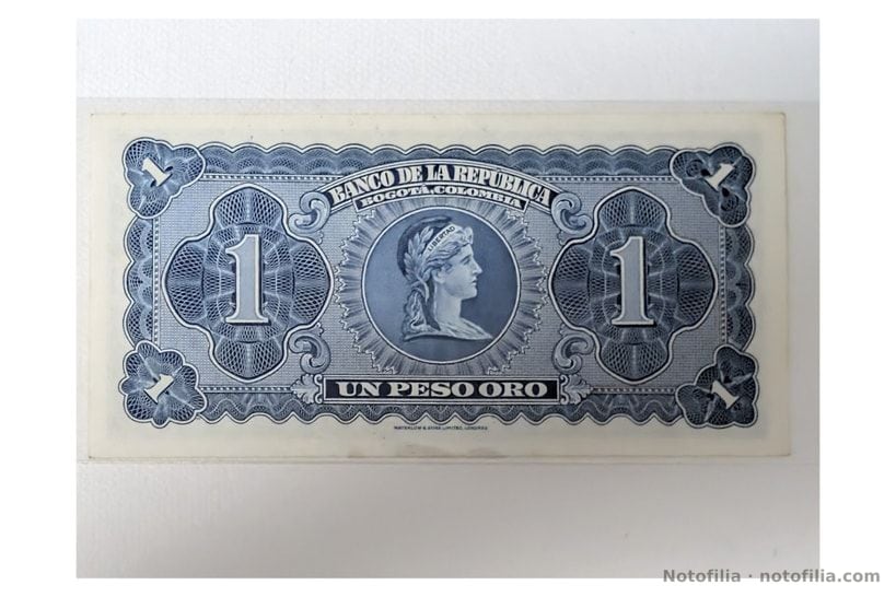 Reverso del 1 peso oro, tipo Pick 398: Libertad con gorro frigio «LIBERTAD» y pie de Waterlow & Sons Limited, Londres.