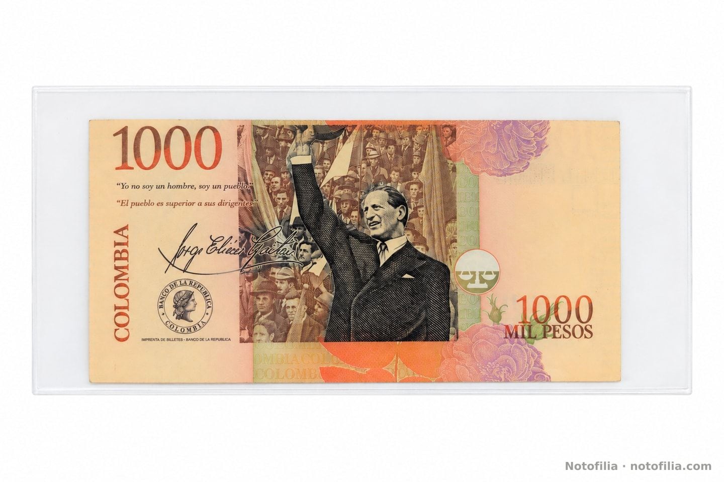 Reverso del 1.000 pesos, Pick 450: Gaitán saludando, las dos citas, la firma manuscrita y el sello del Banco de la República.