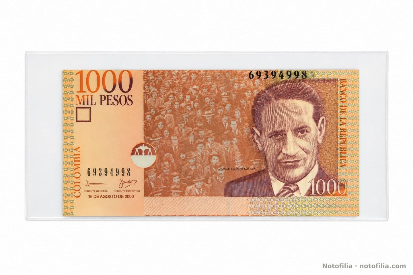 Anverso del 1.000 pesos, Pick 450: Gaitán, serial 693949988 y la fecha 16 de agosto de 2000 bajo las firmas; el canto superior queda justo contra el 1000 y el serial alto.