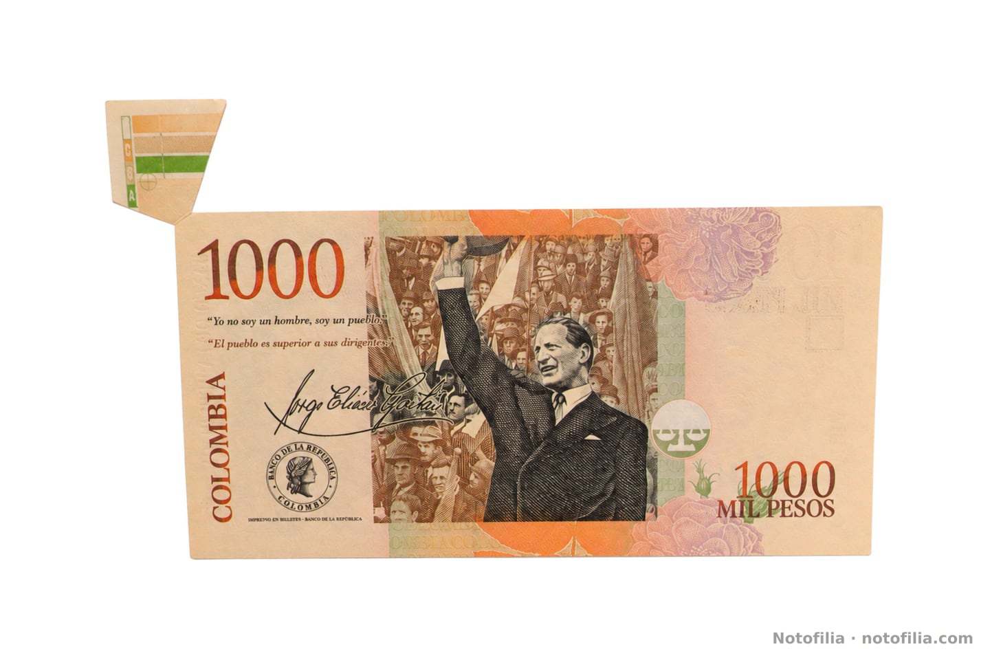 Back of the 1,000 pesos, Pick 456n: Gaitán waving, the two quotations, and the same margin flap, seen from the upper-left edge.