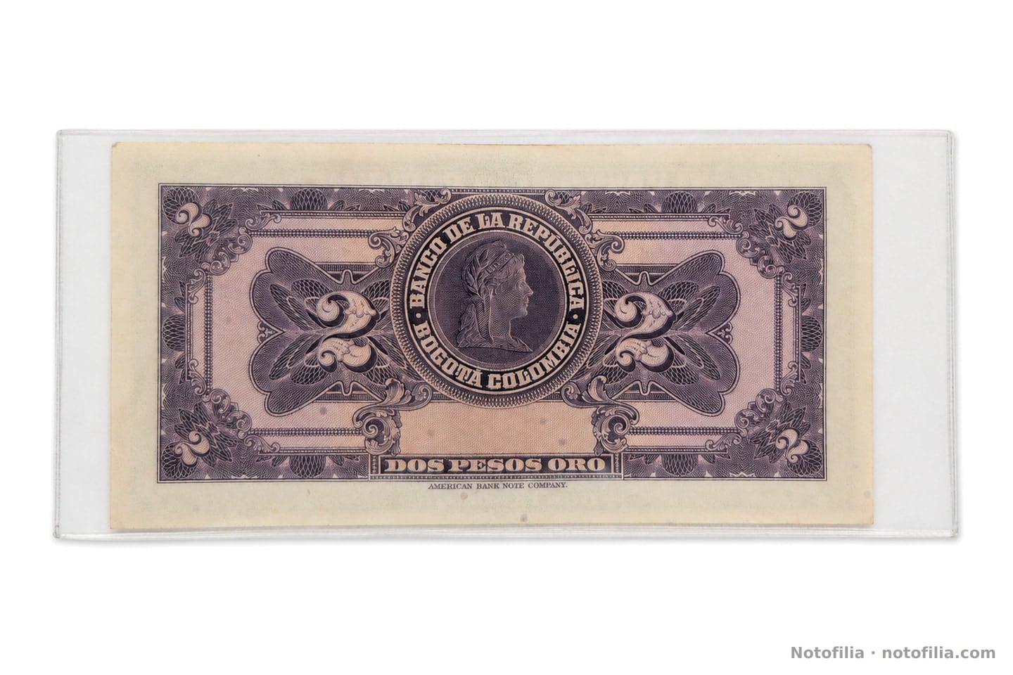 Reverso del 2 pesos oro, Pick 390d: Libertad en medallón violeta, cifras 2 y pie de la American Bank Note Company.
