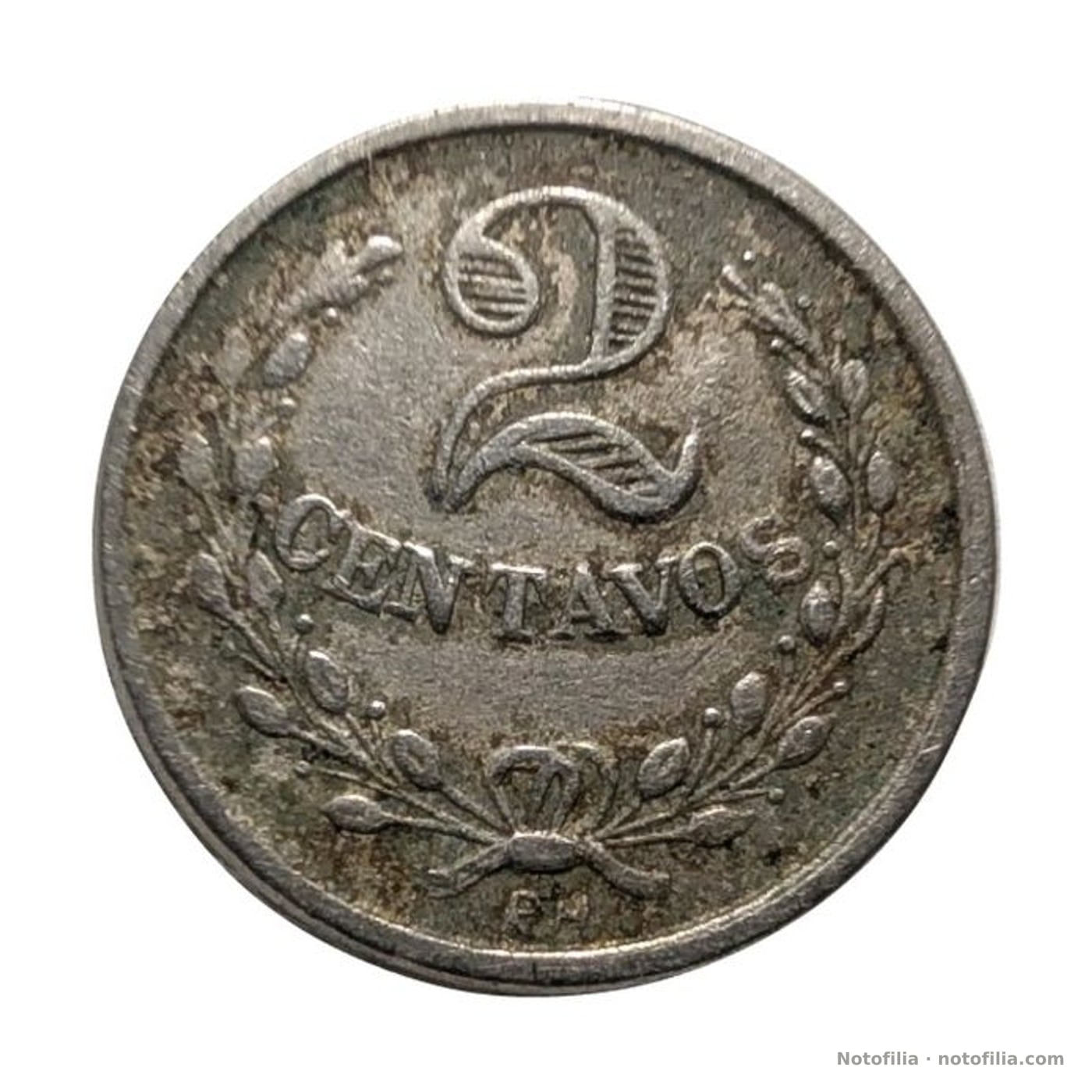 Reverso: 2 ornamental sobre CENTAVOS, dentro de una corona atada con lazo.