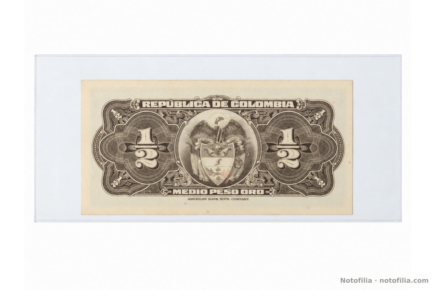 Reverso del medio peso oro, Pick 345b: escudo nacional, cifras 1/2 y pie de la American Bank Note Company.
