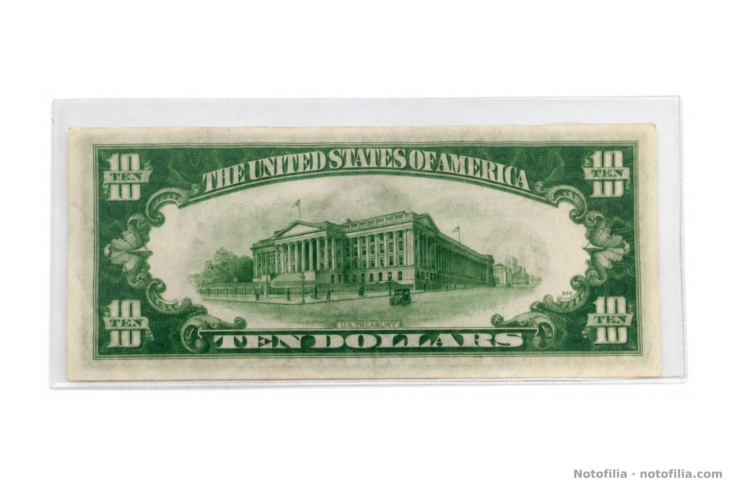 Back of the Series 1934A $10: the Treasury building and TEN DOLLARS. No IN GOD WE TRUST motto.