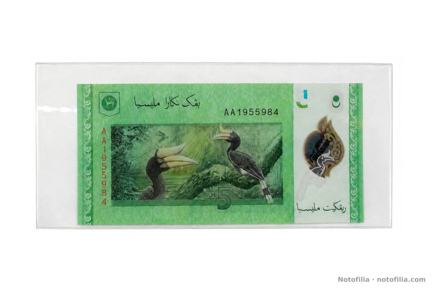 Reverse of the RM5: two rhinoceros hornbills, the bank’s kijang, Jawi legends, and both AA 1955984 serials.