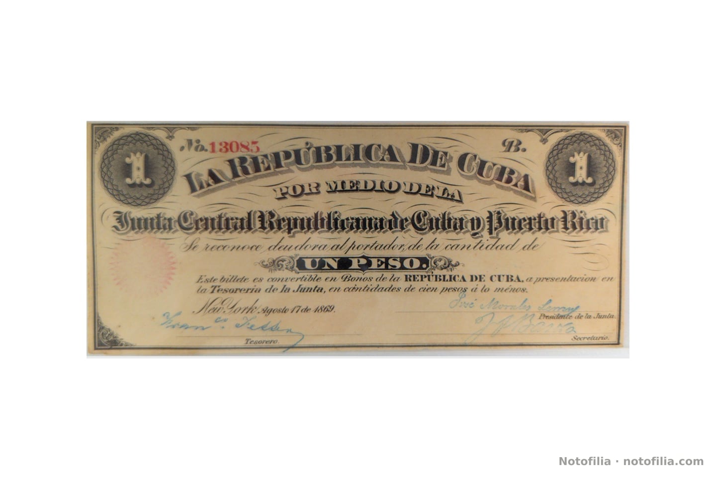 Anverso del billete de 1 peso P#61: Junta Central Republicana, N.º 13085 serie B, Nueva York 17 de agosto de 1869; medallones con el 1 y firmas de Morales Lemus, Bassora y el Tesorero.