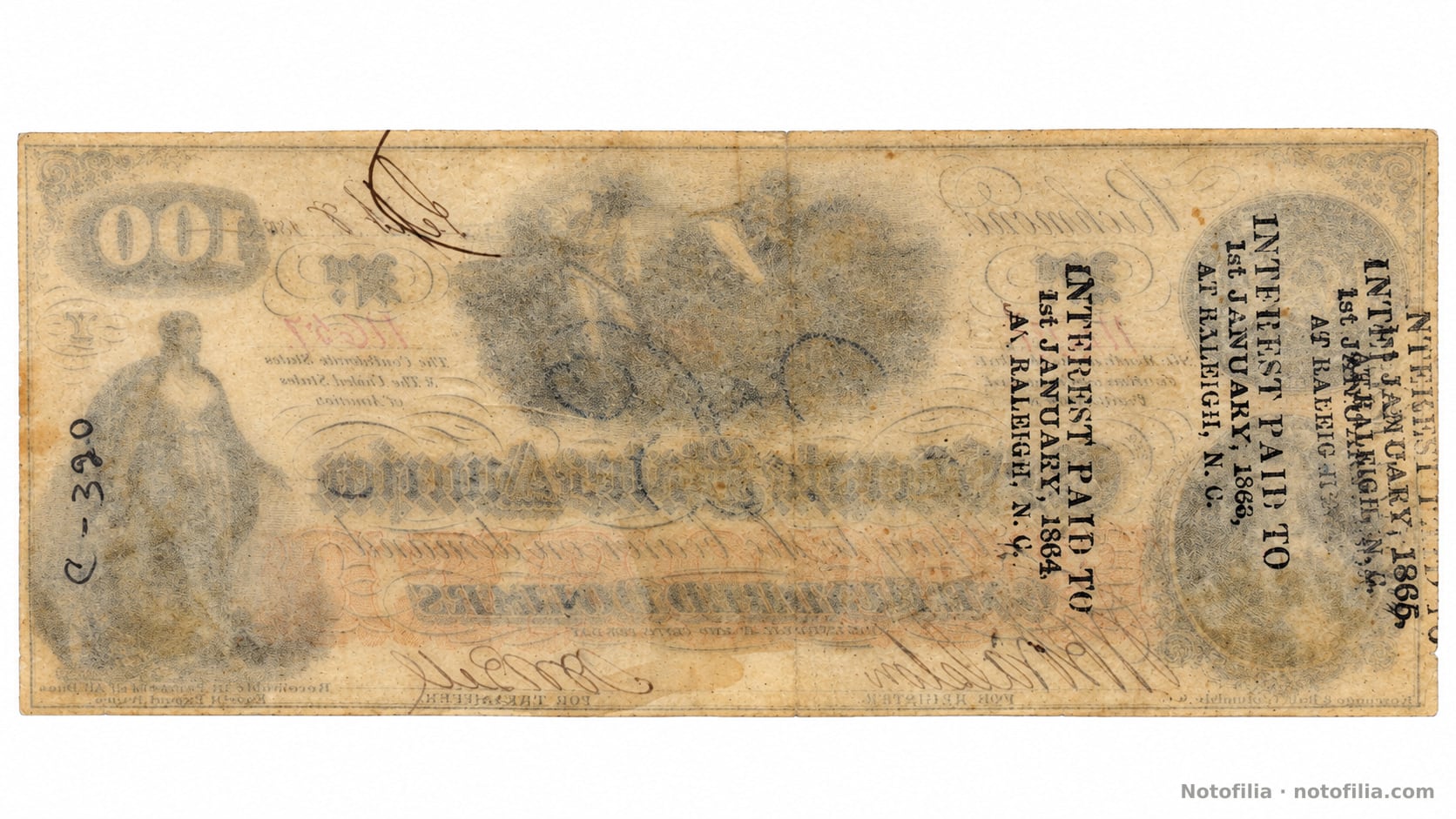 Reverso sin diseño impreso, con traspaso del anverso, marca manuscrita «C-390» y sellos de interés de Raleigh, N.C., que parecen referirse al 1 de enero de 1863, de 1864 y de 1865.