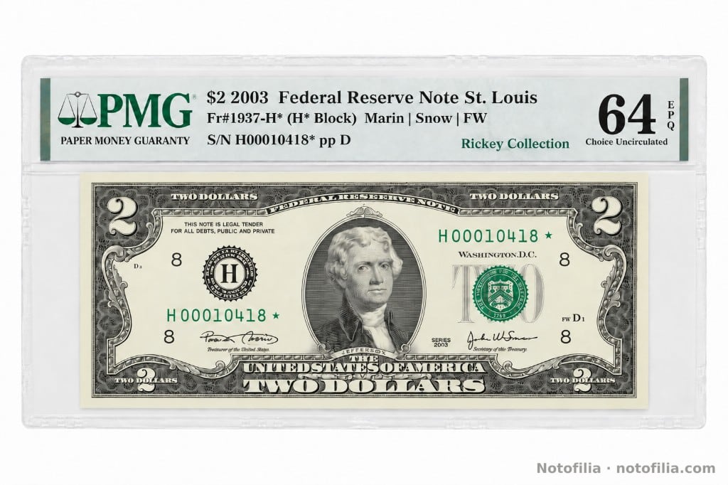Anverso encapsulado del 2 dólares, serie 2003, distrito de San Luis, serial H 00010418 ★: Jefferson, sello verde del Tesoro y etiqueta PMG 64 EPQ.