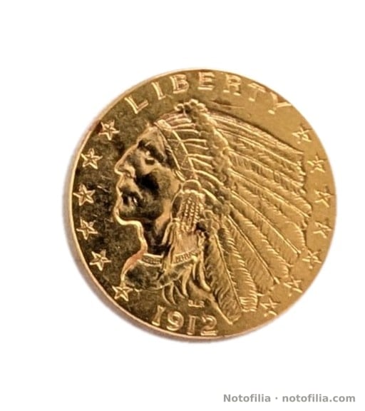 Obverse: left-facing bust in a feathered headdress; LIBERTY; thirteen stars; 1912.