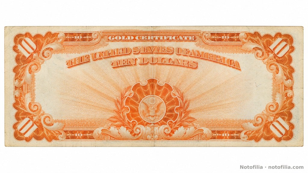 Reverso naranja-oro del 10 dólares, serie 1922, serial K53955033: GOLD CERTIFICATE, águila heráldica y grandes 10.