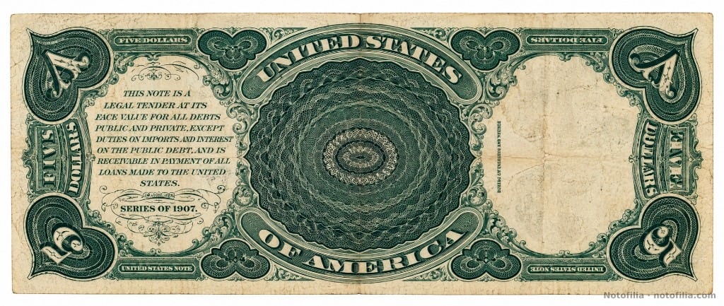 Reverso del 5 dólares, serie 1907, serial M12980830: cláusula de curso legal, SERIES OF 1907 y rosetón bajo UNITED STATES OF AMERICA.