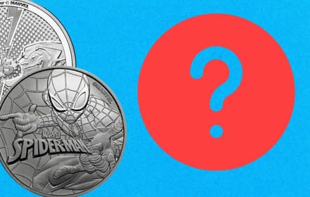 Silver coin with high-relief Spider-Man on a web ground and the Marvel mark