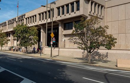 Façade of the United States Mint in Philadelphia, with the Department of the Treasury sign